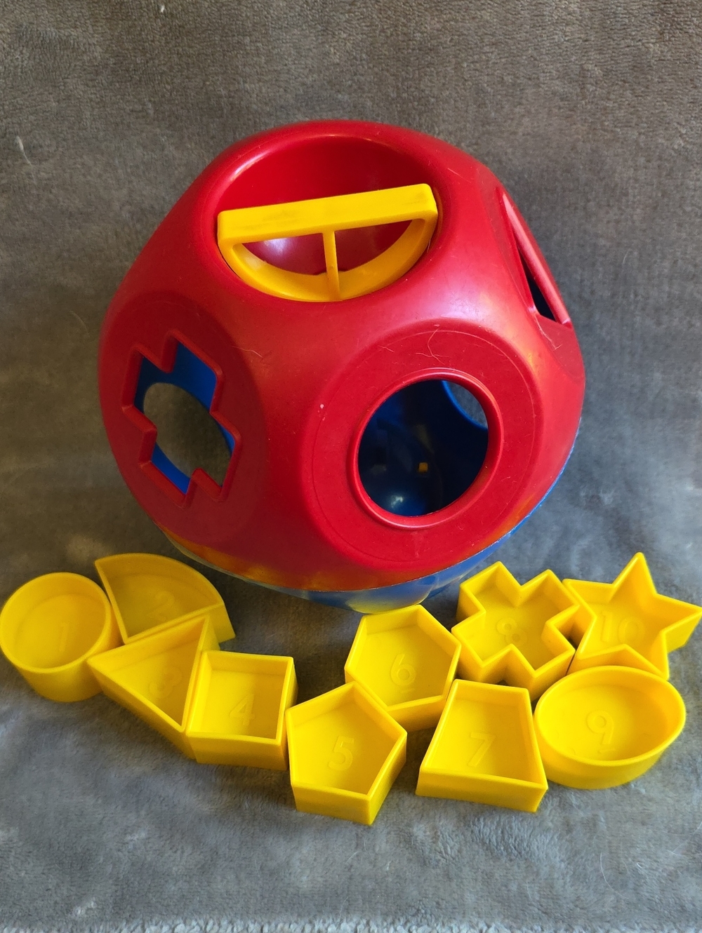 Tupperware Red, Blue and Yellow Shape O Ball Sorter